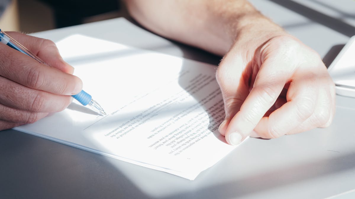 Closing contract signing pen desk