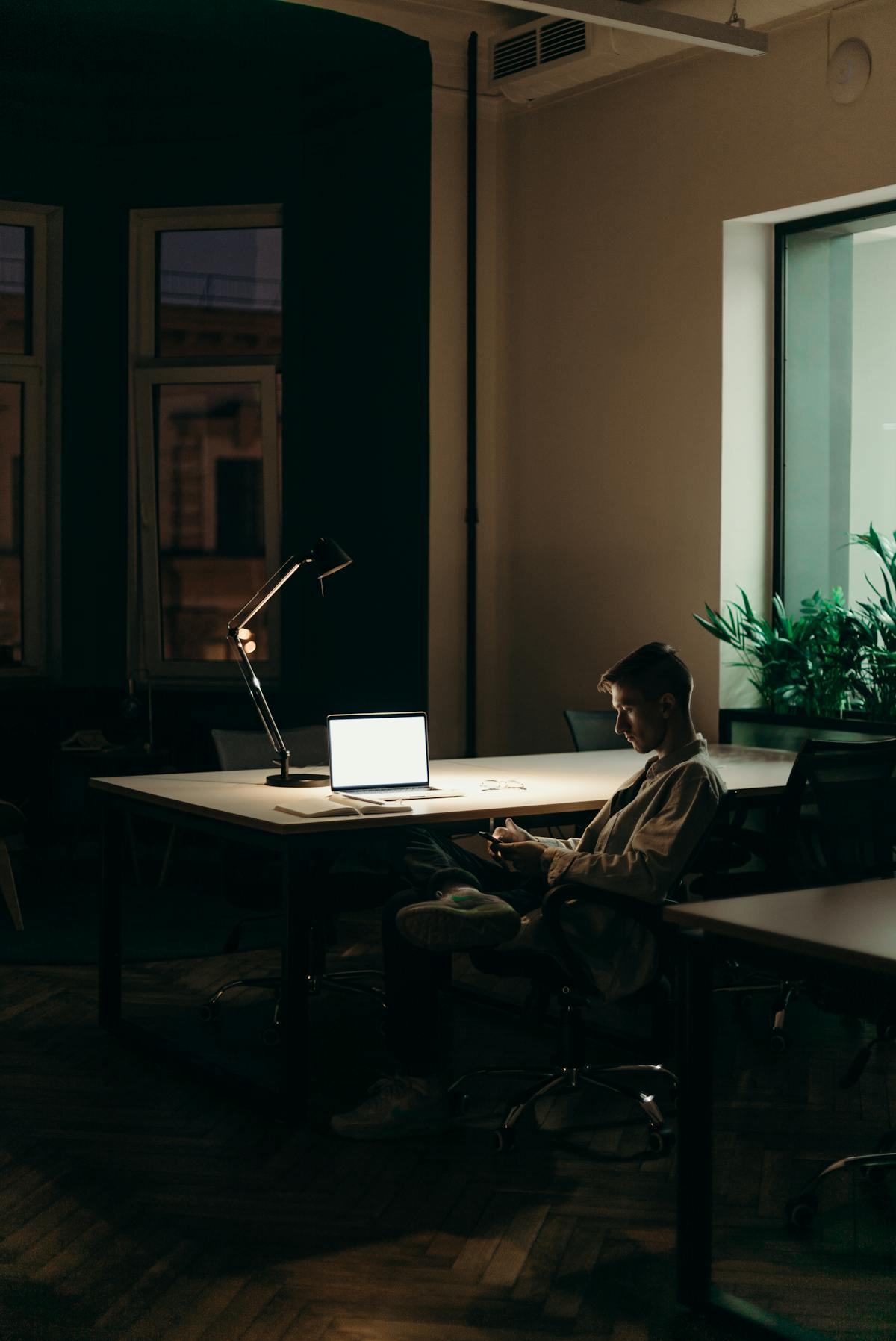 Founder working late laptop office