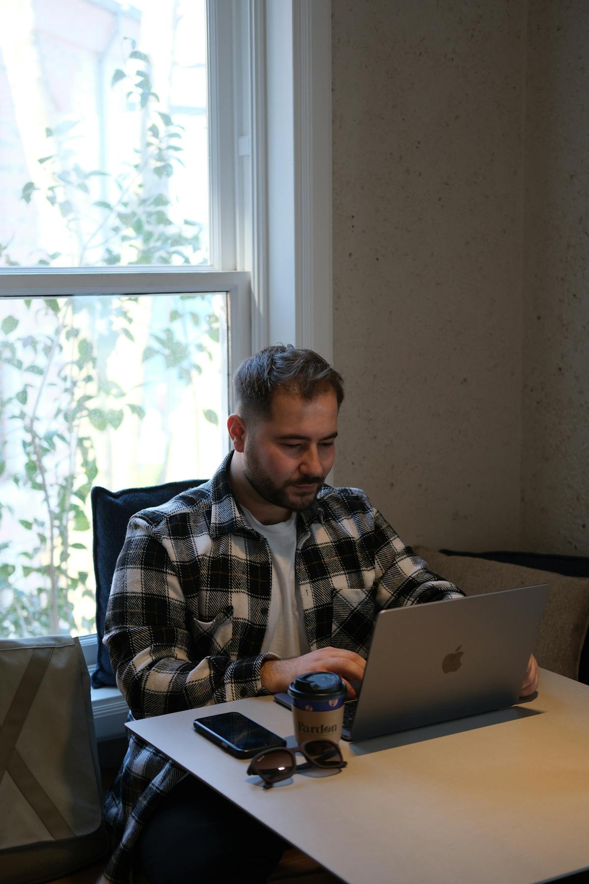 Man working laptop office focused