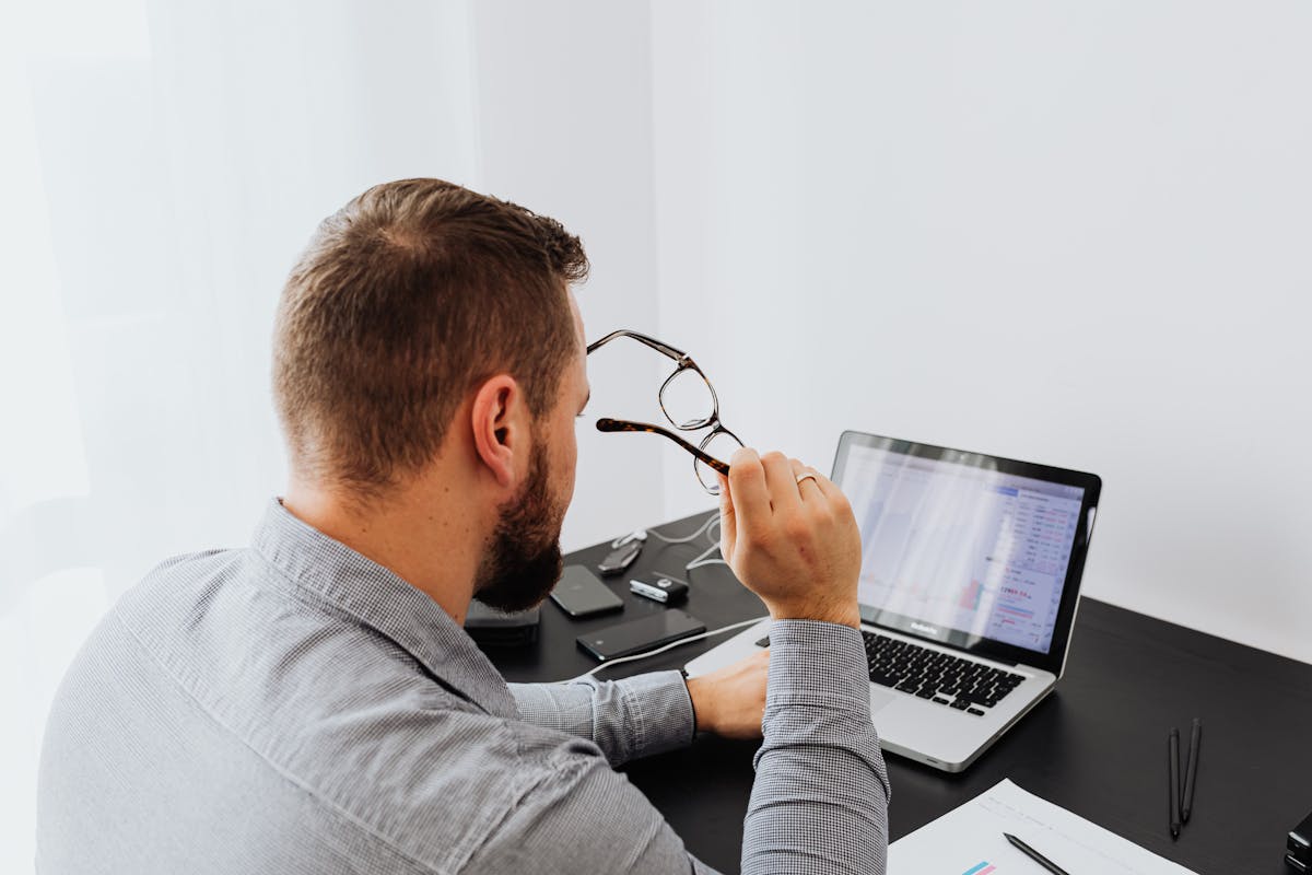 Man working laptop office focused
