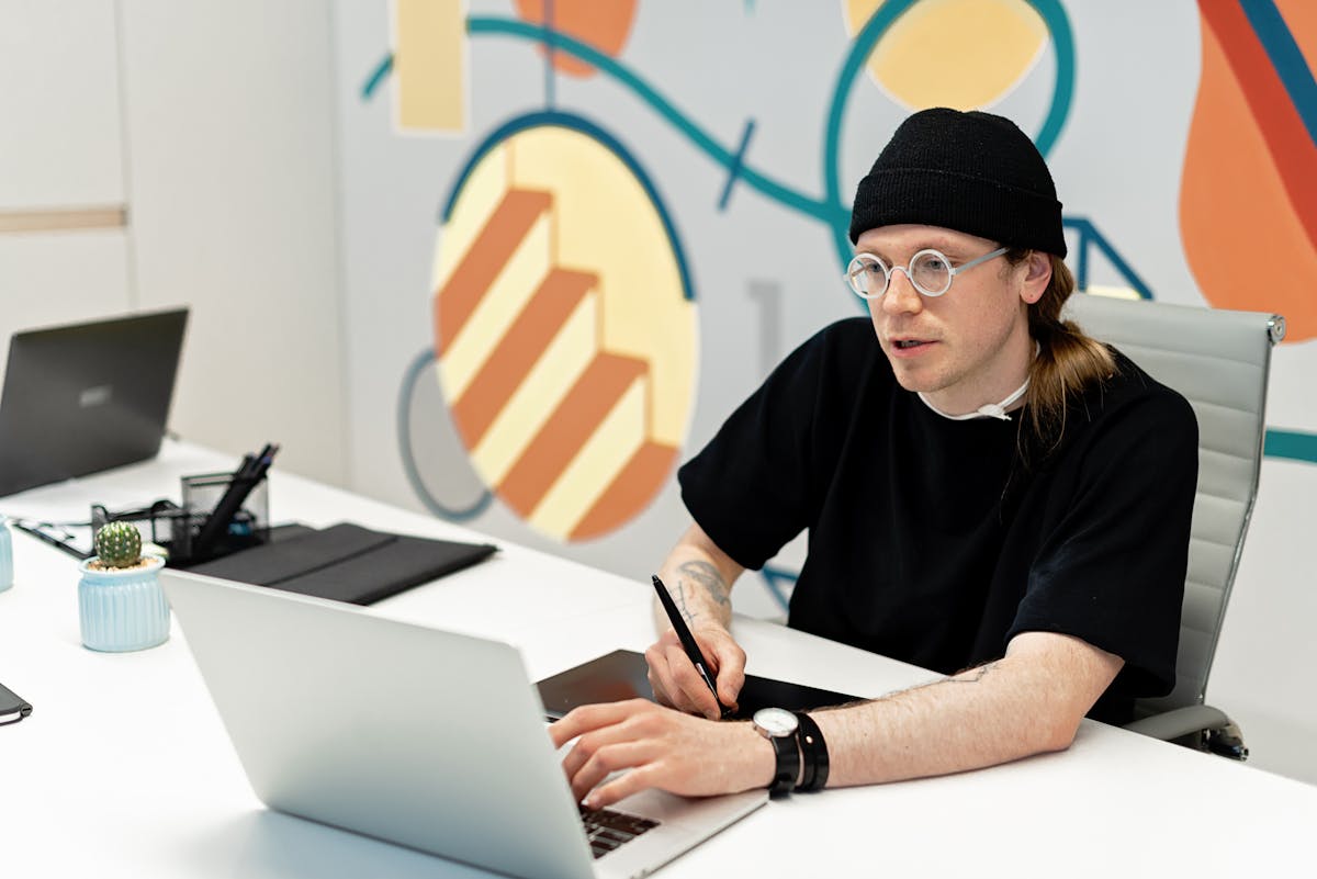 Man working laptop office focused