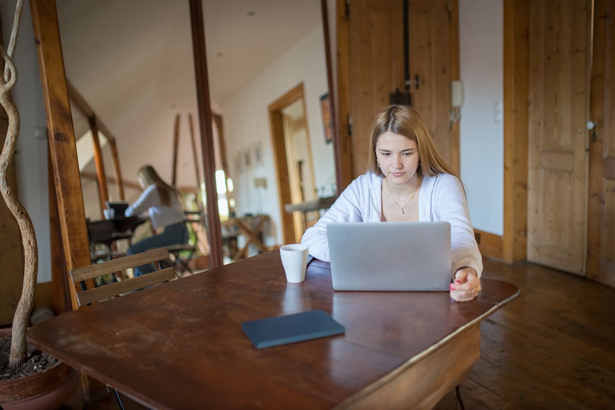 Woman working home laptop remote