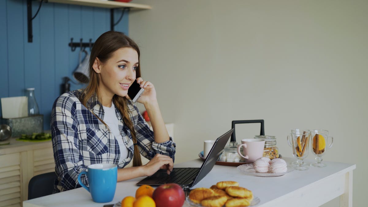Woman working home laptop remote